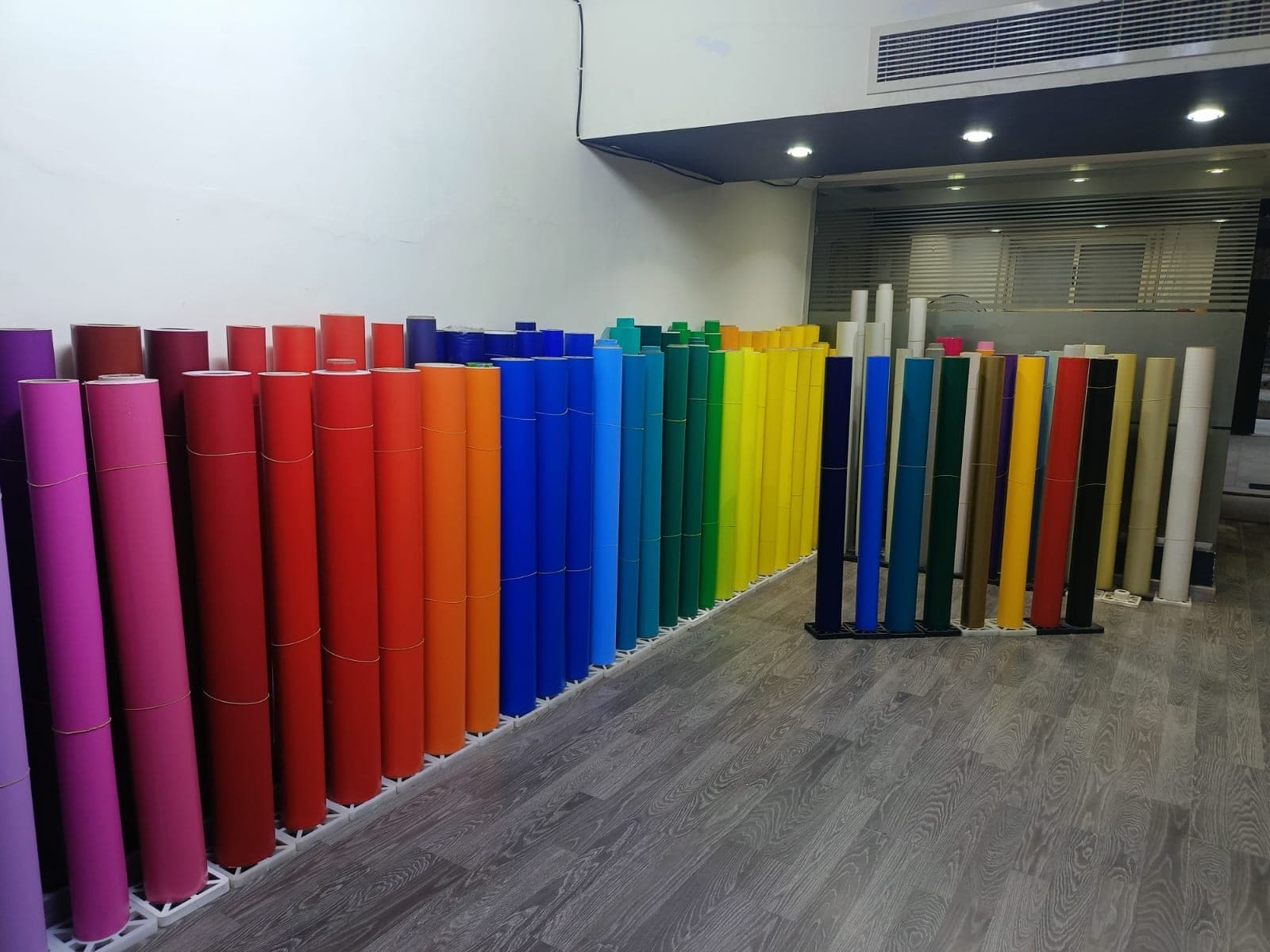 Rolls of banner and vinyl media in stock, ready to print